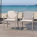 Christopher Knight Home Oaklen All Weather Outdoor Metal and Rattan Dining Chairs with Cushions (Set of 2)