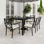 Sedia da pranzo impilabile per patio da interni ed esterni Martha Stewart Lily Pond con braccioli, telaio in acciaio nero e cuscino in crema per tutte le stagioni