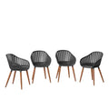 Amazonia 4-Piece Recycled Resin and Solid Wood legs Patio Dining Armchair Set Black