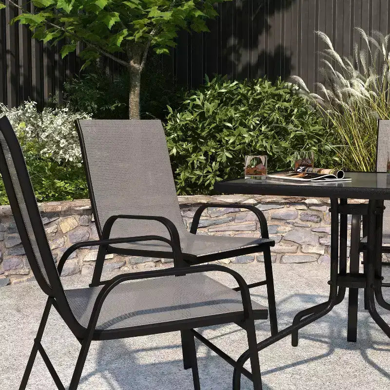 Merrick Lane Lot de 4 chaises de patio empilables Manado en métal avec matériau Flex Comfort