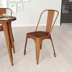 Sedia da pranzo impilabile Merrick Lane Wells per interni/esterni in metallo con schienale a doghe singole e finitura verniciata a polvere