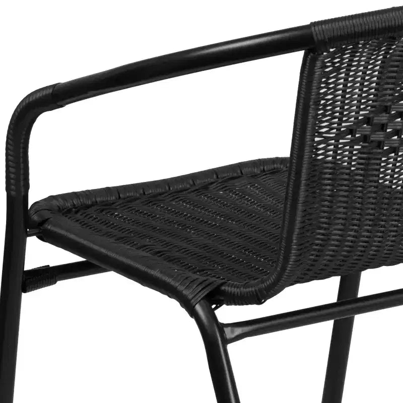 Sedia impilabile da ristorante Emma and Oliver 4 Pack in Rattan per interni ed esterni con schienale curvo
