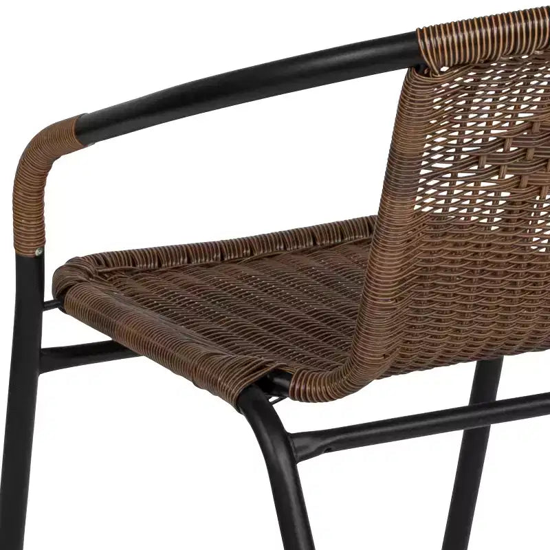 Sedia impilabile da ristorante Emma and Oliver 4 Pack in Rattan per interni ed esterni con schienale curvo