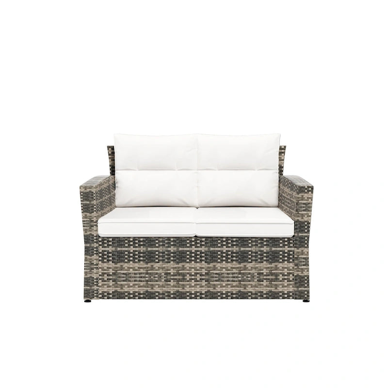 Set da patio e tavolino contenitore Cruz a 4 pezzi in vimini per esterni con cuscini