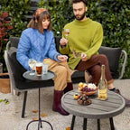 Divanetto da patio in vimini Fernald con cuscini e cuscini lombari