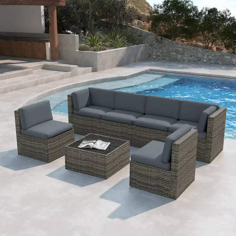 Set di divani da esterno in vimini a 7 pezzi con cuscini