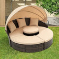 Lettino rotondo in rattan con baldacchino stile Bali per esterni, Divano letto da esterno in vimini con tavolino da caffè a scomparsa
